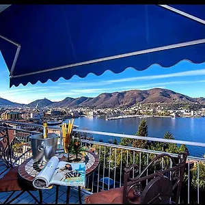 Lo Specchio Sul Lago - The House Of Travelers شقة